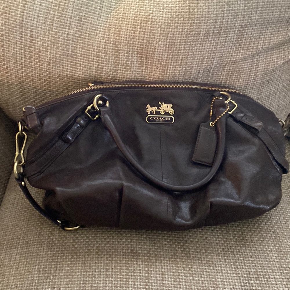 Coach brown soft leather purse with shoulder strap.
